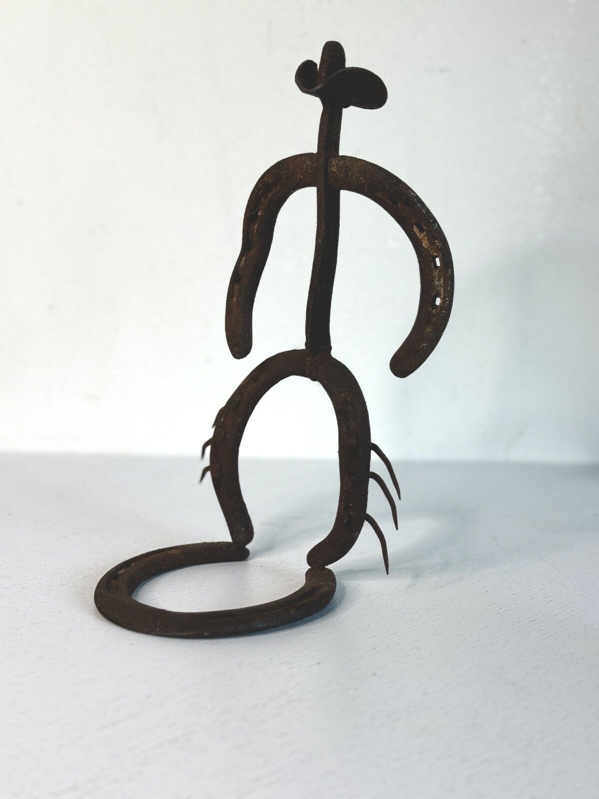 Vintage Horseshoe Bow Legged Cowboy Sculpture Metal Art MCM