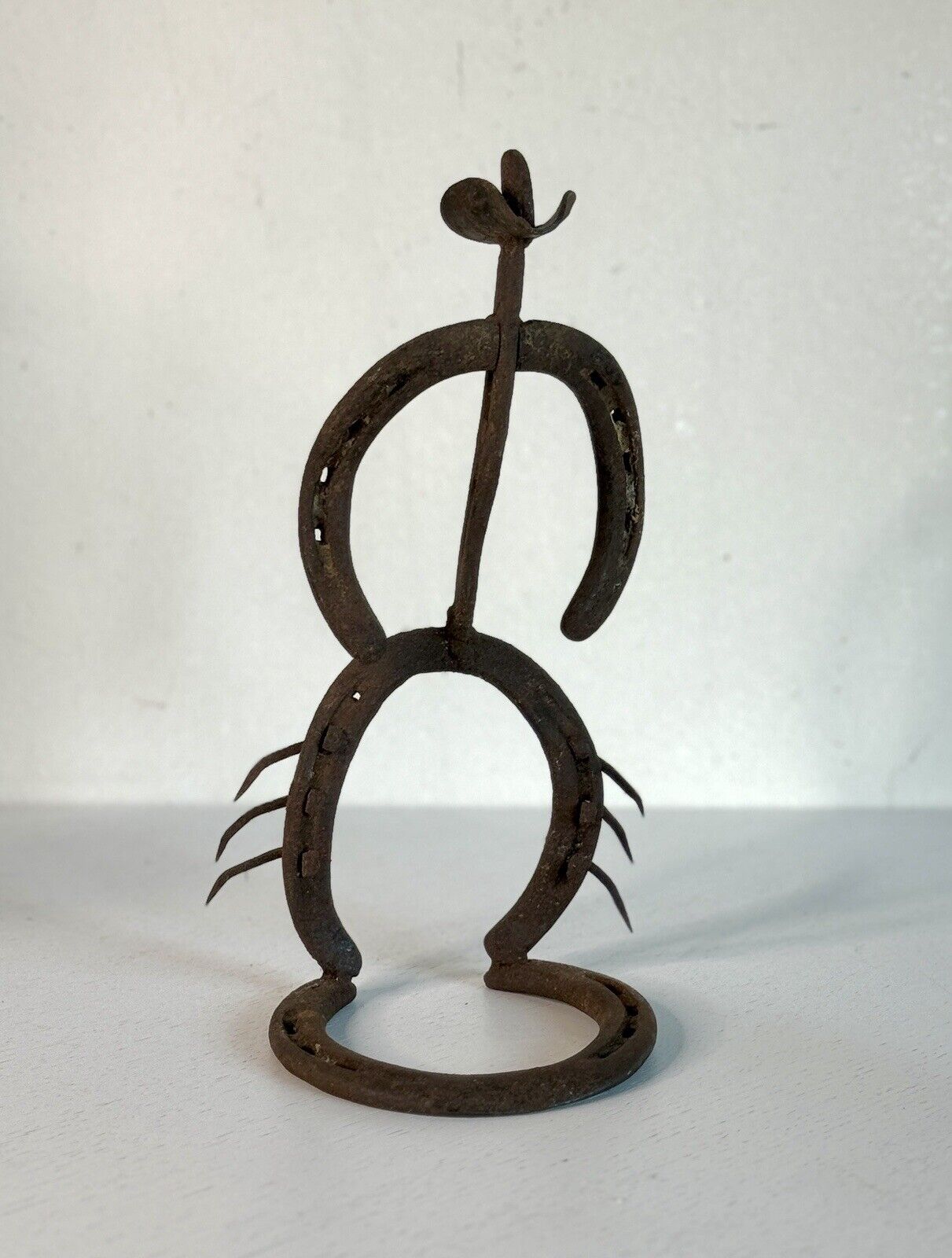 Vintage Horseshoe Bow Legged Cowboy Sculpture Metal Art MCM