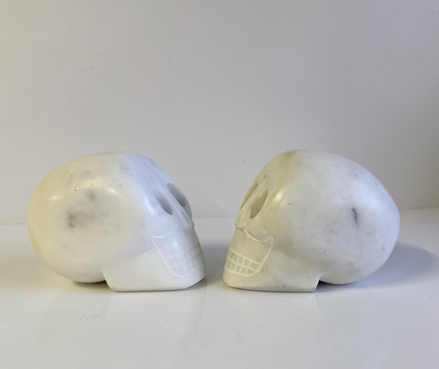 Vintage Pair Of Marble Hand carved Carved Skull Bookends