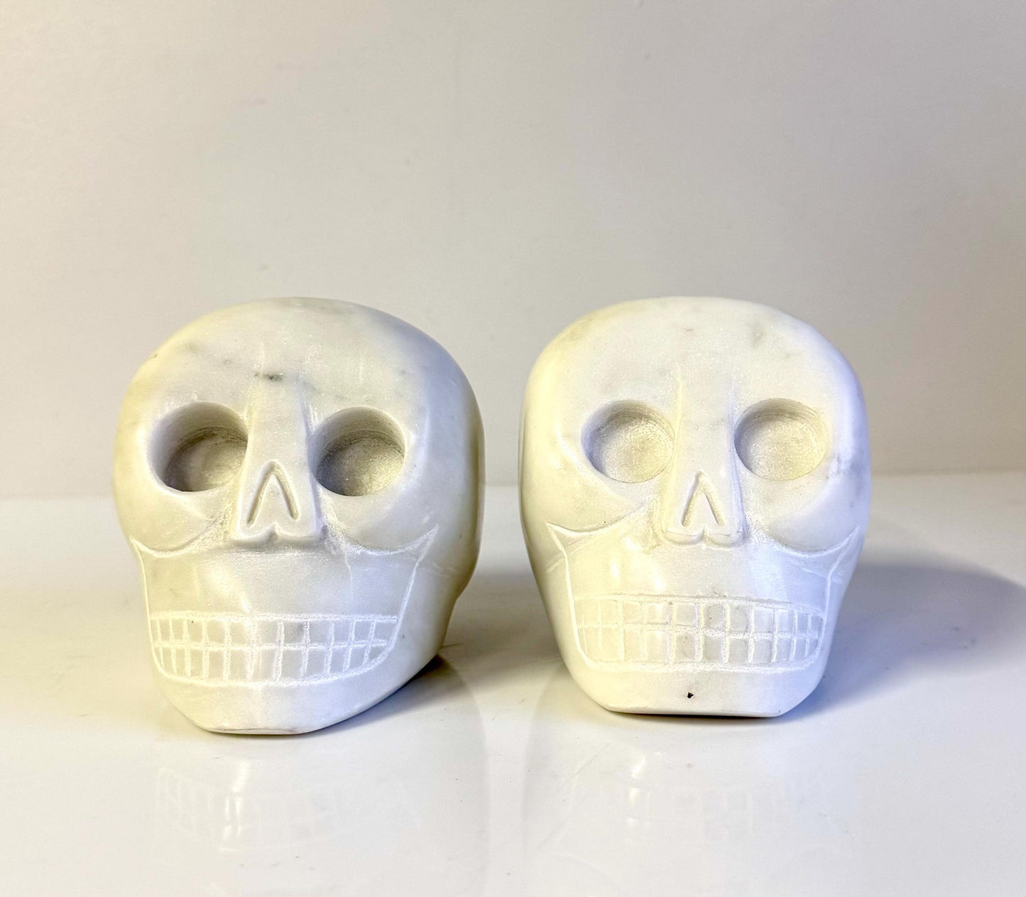Vintage Pair Of Marble Hand carved Carved Skull Bookends