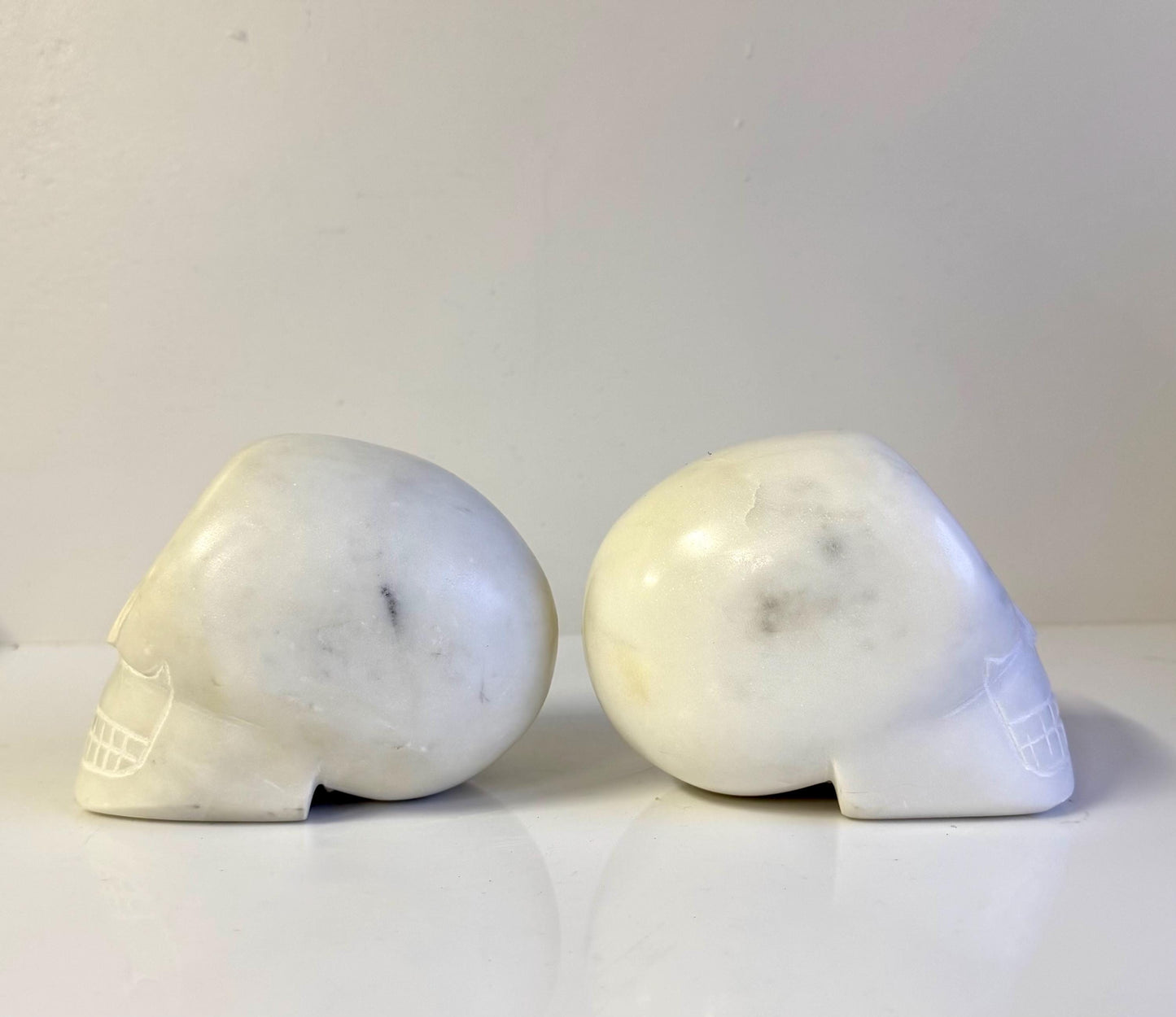 Vintage Pair Of Marble Hand carved Carved Skull Bookends